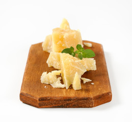 Parmesan cheese on cutting board