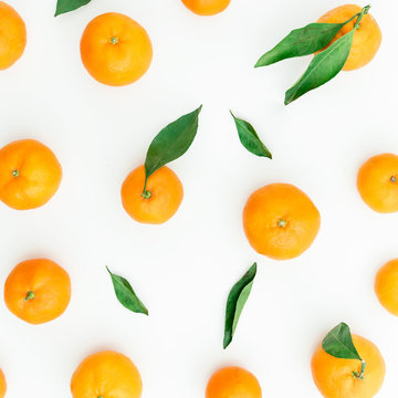 Mandarin on white background. Flat lay. Top view