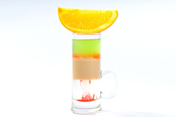 alcohol cocktail on a white with fresh summer fruits