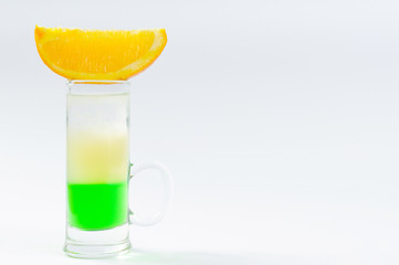 cocktail set on a white with fresh summer fruits