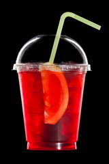 summer cocktail of fruit and citrus on black