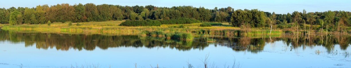 Evening summer lake panorama.