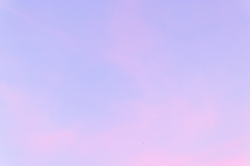 Fototapeta premium Color through clouds in the evening sky.