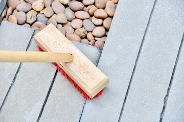 Close-Up View of Floor Scrubbing Brush with Handle