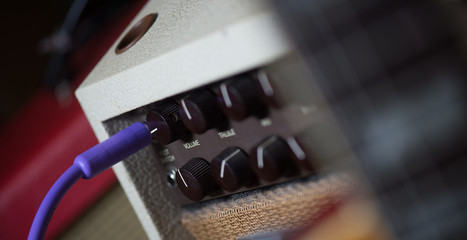 Fototapeta na wymiar Guitar amplifier with jack cable