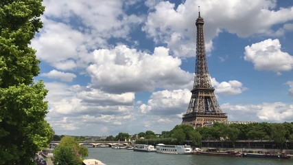 Riverside daytime view of the Seine river and Eiffel tower on background, 4k