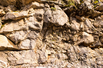 Stone cliffs in the mountains as a background