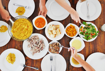 Top view of plates with different food on the table