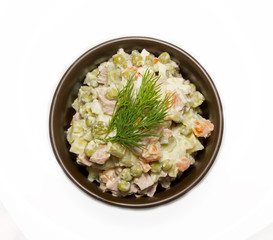 Salad Olivier isolated on white.Top view.