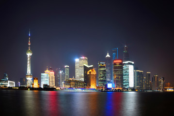 Shanghai, China city skyline on the Huangpu River.