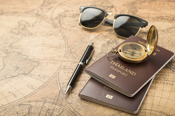 Planning travel concept, Thailand passport on old map