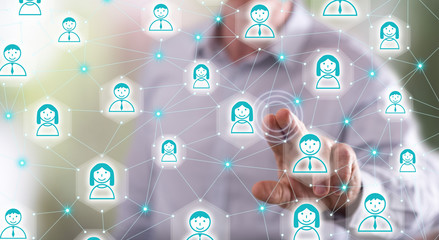 Man touching a social network concept on a touch screen