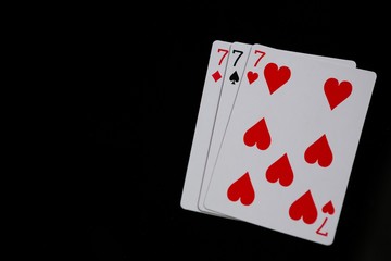 Close-up of three cards