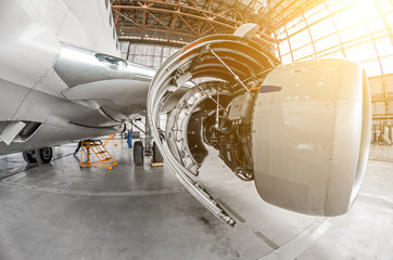 Aircraft service, view of the open engine hood © aapsky