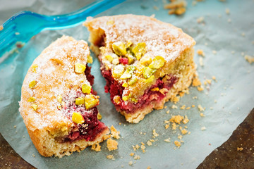 Cherry shortcrust pastries with pistachio nuts 