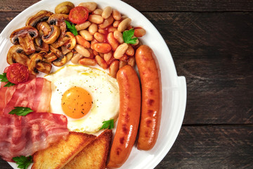 Overhead shot of English breakfast with copyspace