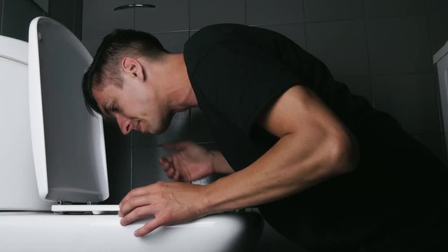 Throwing up in bathroom toilet