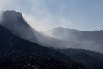 Smoke blowing off Perin's peak during Lightner Creek forest fire in Durango, Colorado
