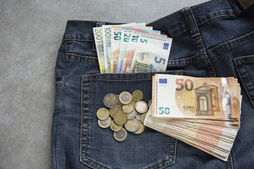 Euro banknotes in the jeans packet