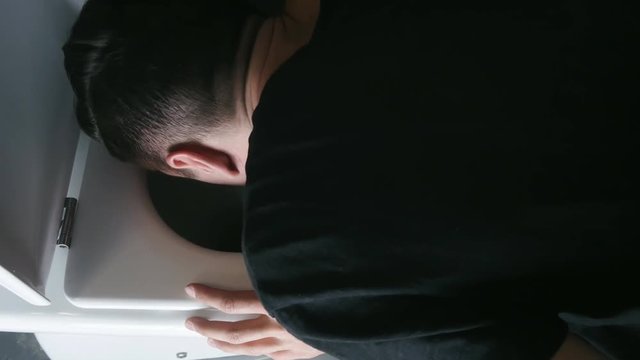Throwing up in bathroom toilet
