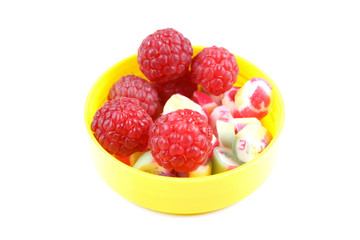 Raspberry on a glossy surface