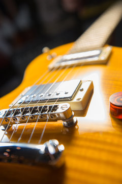 Close up of an electric guitar bridge