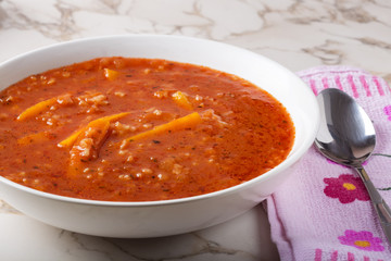 Summer soup made from tomato sauce, rice and carrot