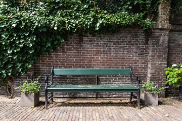 Foto auf Leinwand Bankje in Abraham Dolehof Utrecht © Wil