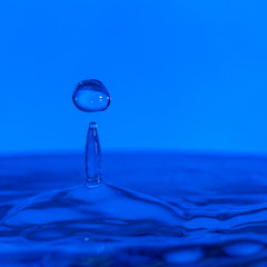 Fototapeta na wymiar A drop of water create a stunning random water effect.