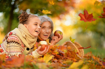 little girl having fun with grandmother