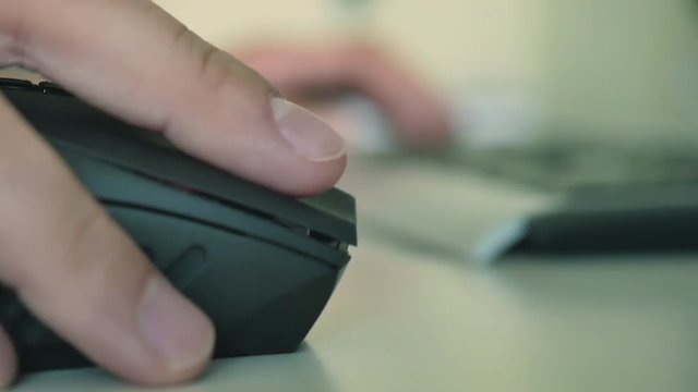 The person types the text on the keyboard. man working on a computer