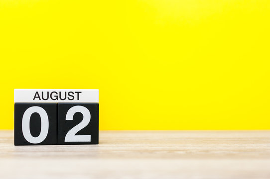 August 2nd. Image of august 2, calendar on yellow background. Summer time. With empty space for text