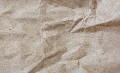 Texture of crumpled craft paper. Rectangular background.