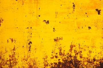 Rusted yellow painted metal. Abstract texture matal background.