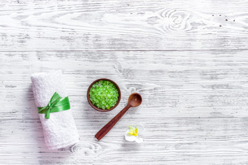 Skin care. Spa salt on wooden table background top view copyspace