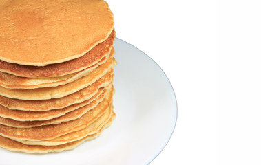 Fototapeta na wymiar Closed up stack of fresh homemade plain pancakes served on plate, white background with free space for design and text 