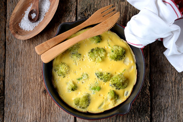 Omelette with broccoli in a cast-iron frying pan, healthy breakfast. Healthy food.