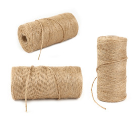 Burlap jute twine coil bobbins isolated on white