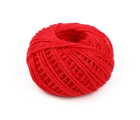 One red twine jute coil bobbin isolated on white