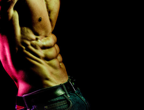 Muscular guy in jeans with belt. Men's fashion. Trousers for men. Strong male athlete. Young athletic man with abs, six pack. Male model sexy. Naked torso. Bodybuilder fitness model. Male body