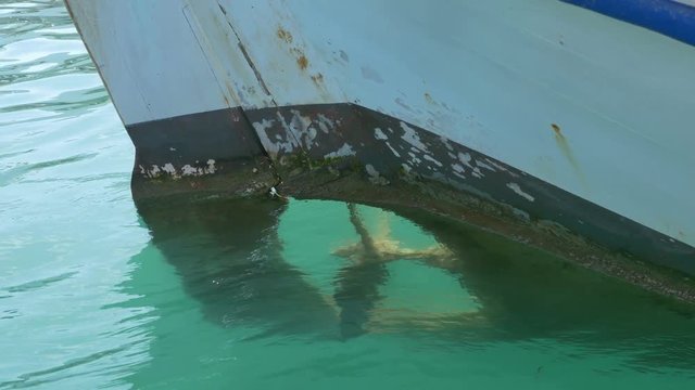 Fishing boat small rudder and propeller.