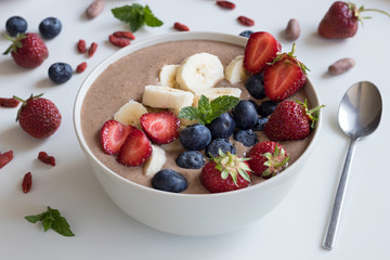 Summer breakfast - breakfast bowl with strawberries and blueberries