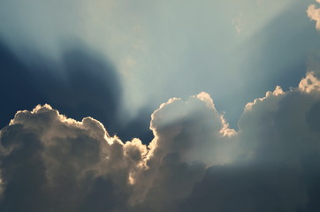 the sky, sun rays through clouds, background