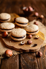 Delicious hazelnut shortbread sandwiches filled with chocolate cream