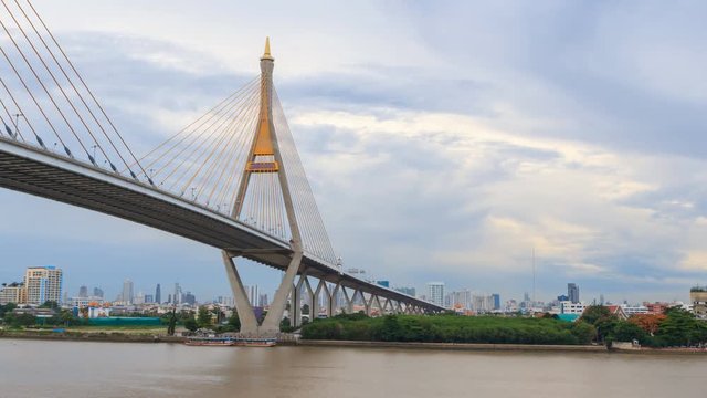 Day to Night time lapse Beautiful Big Bhumibol Bridge with reflections of lighting at river / Big bridge at the river