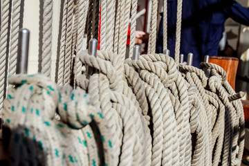 Fototapeta na wymiar old ropes on ship deck