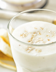 Milkshake with banana and oatmeal , healthy breakfast