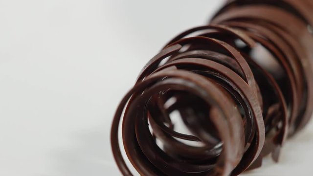 Sweet tubes - dessert. Chocolate tube for decoration, closeup