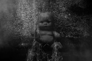 Spooky doll in haunted house 