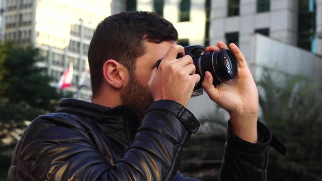 Tourist photographer photographing Paulista Avenue, Sao Paulo, Brazil